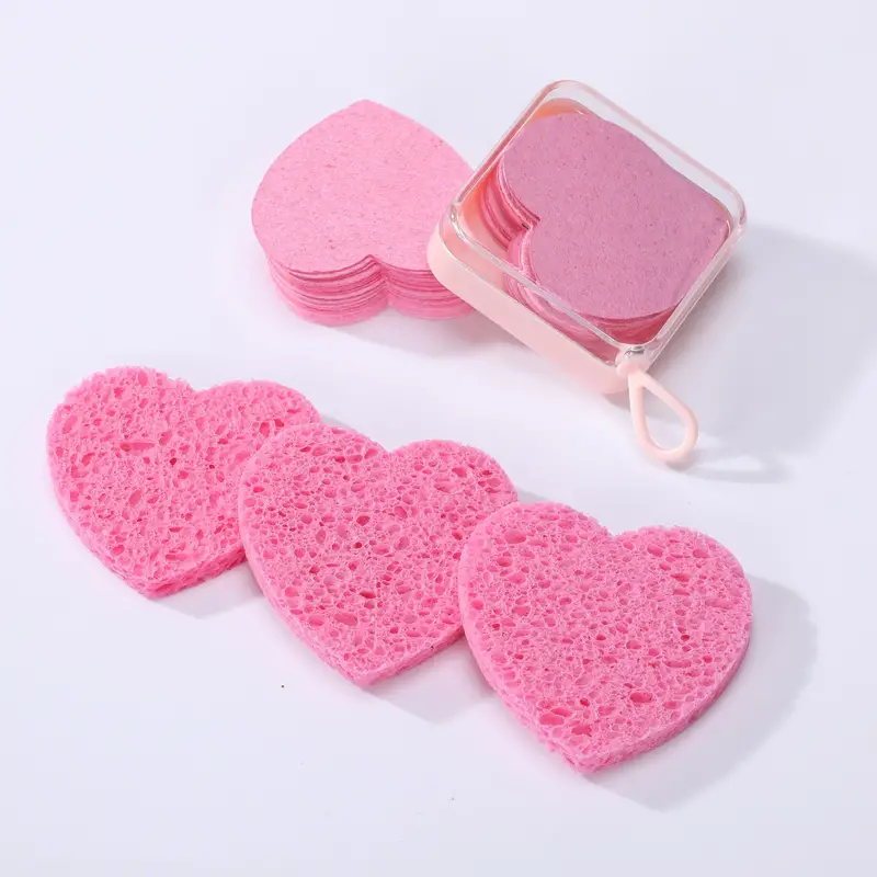 Compact case of pink heart-shaped compressed sponges by Gleamax™